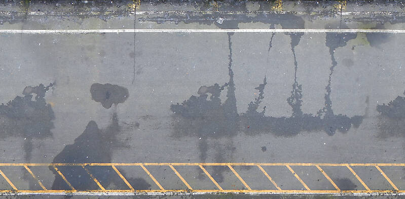 asphalt wet with yellow lines