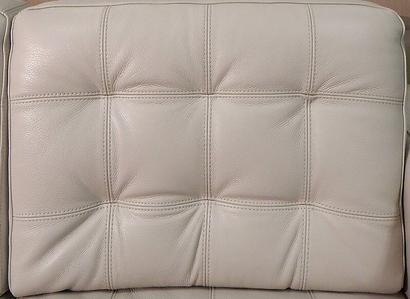 white leather backrest with buttons