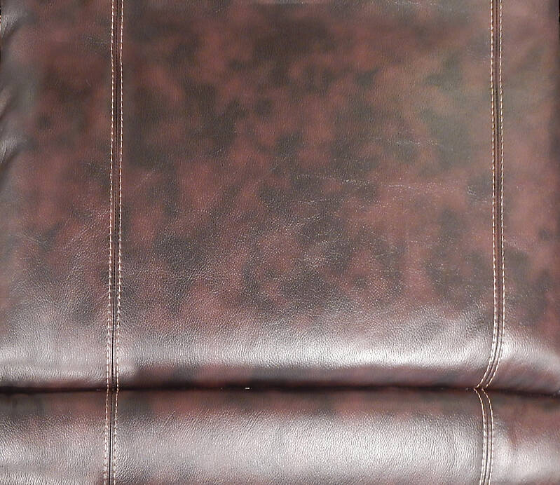 brown leather backrest with sewings