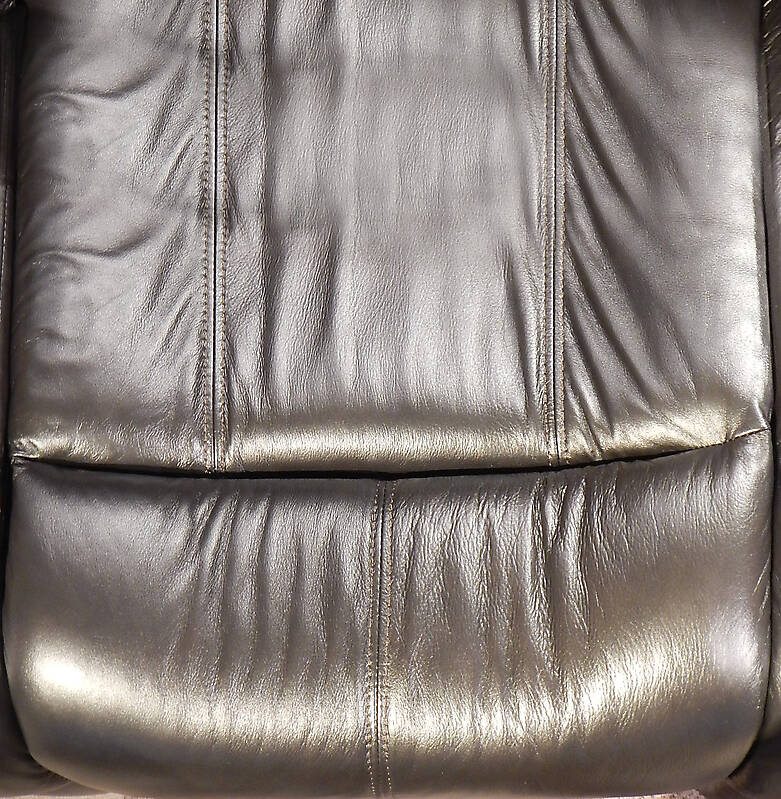 black leather backrest couch pillow