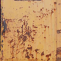 rusty metal door with grate