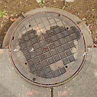 rusty round manhole big 1