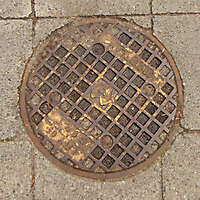rusty round manhole big 3