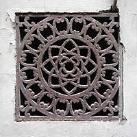 rusty_sewer_cover_with_ornaments_20131007_1732403397