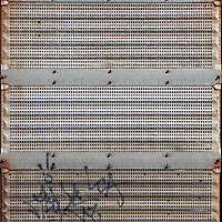 rusty metal panel with holes 1