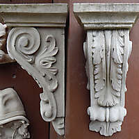 sculpted stone brackets balcony support