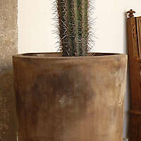 dirt decorated terracotta vase