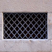 old medieval window with grate 2 