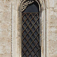 old medieval window with grate 6