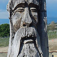 log carved face