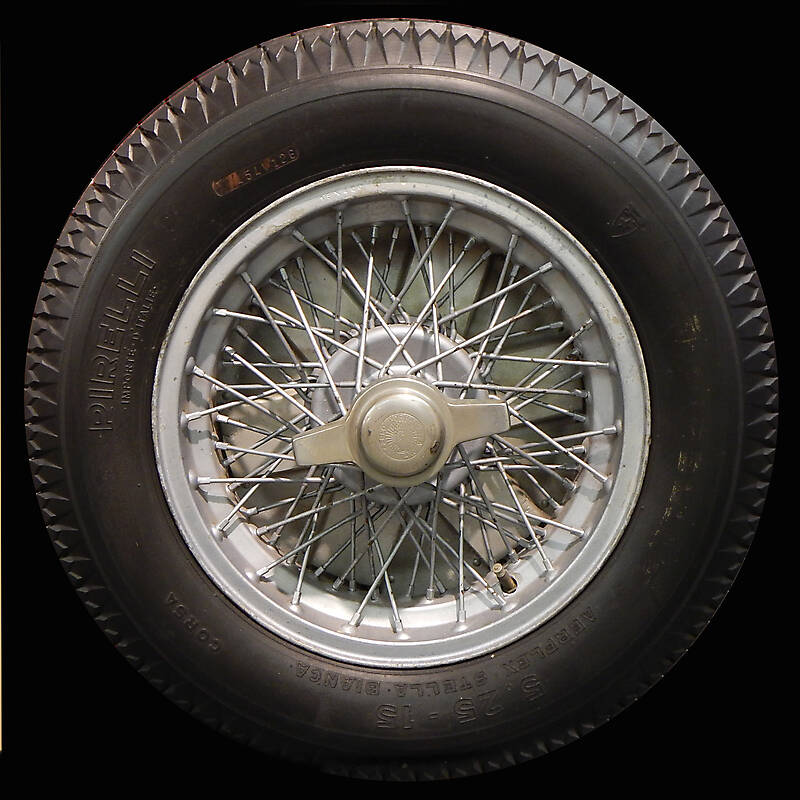 old ferrari car wheel and tyre