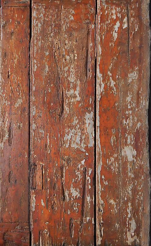 old planks with scraped red paint