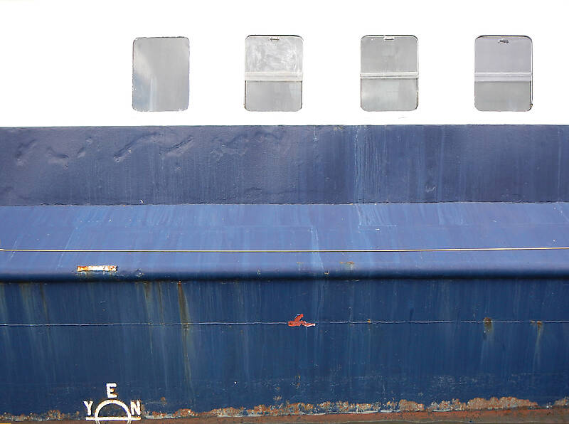 rusty paint ship hull with windows 2