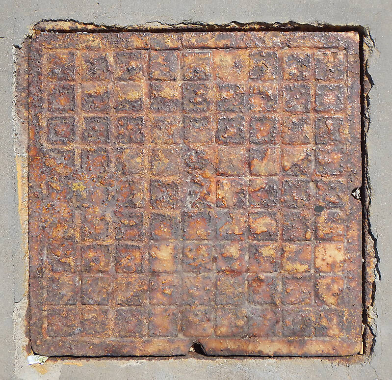 rusty sewer cover 1