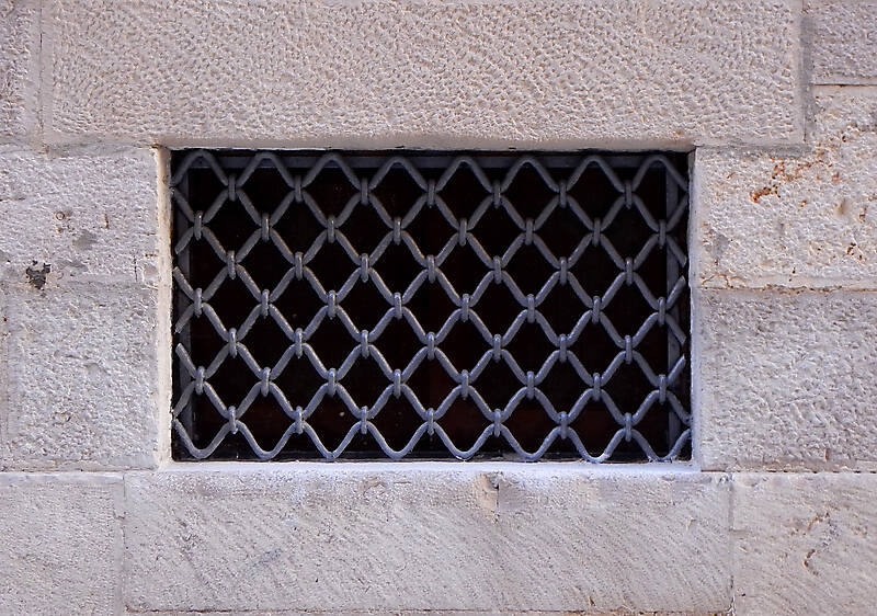 old medieval window with grate 2 