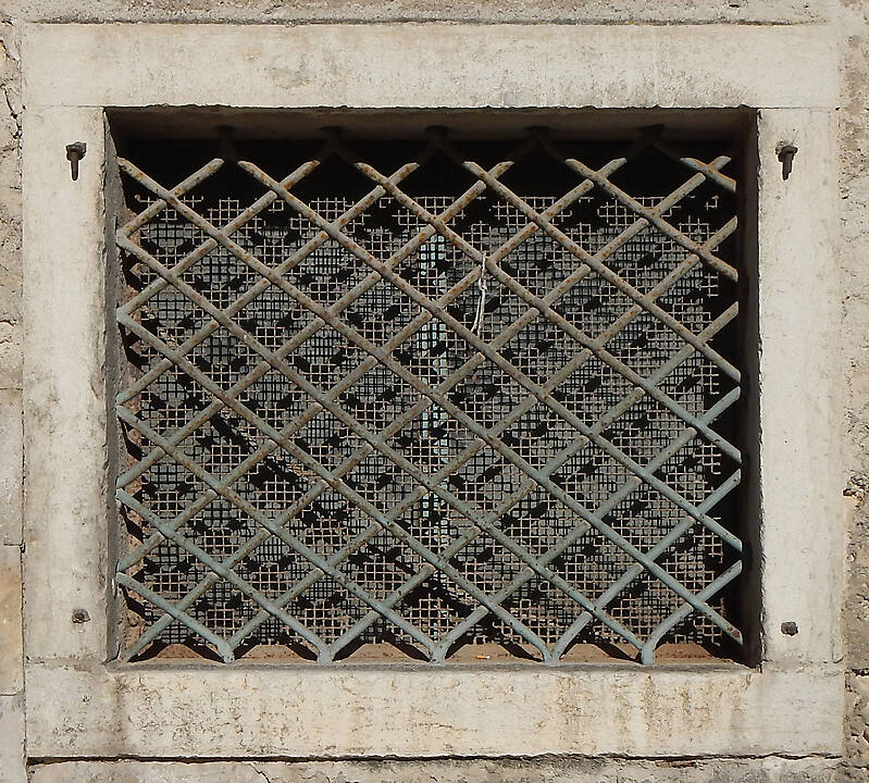 old medieval window with grate 5