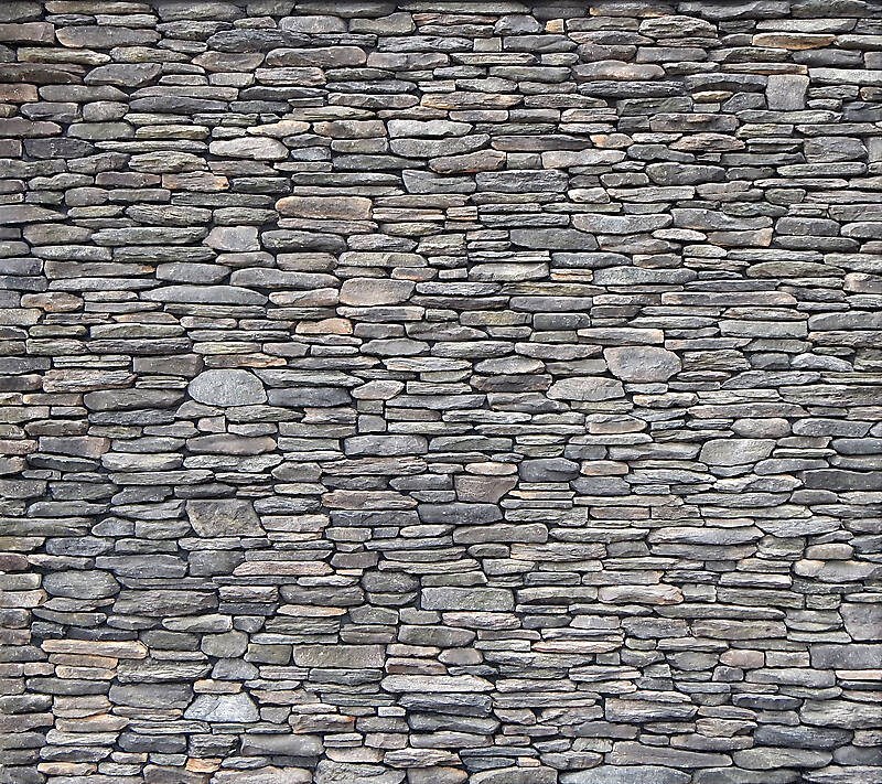 Irregular rock bricks wall dark
