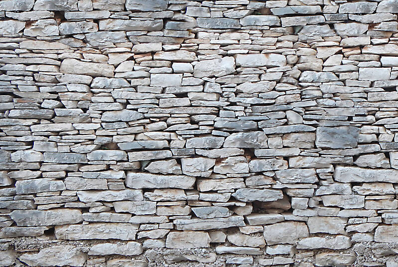 Irregular rock bricks wall