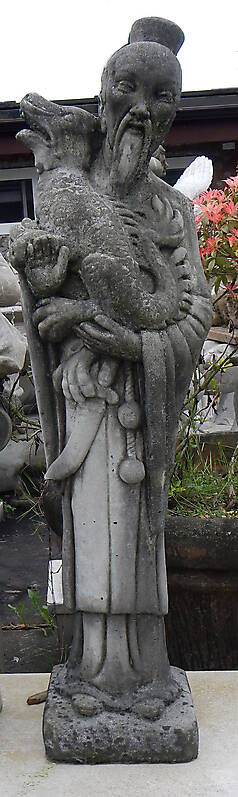 chinese statue man and dragon