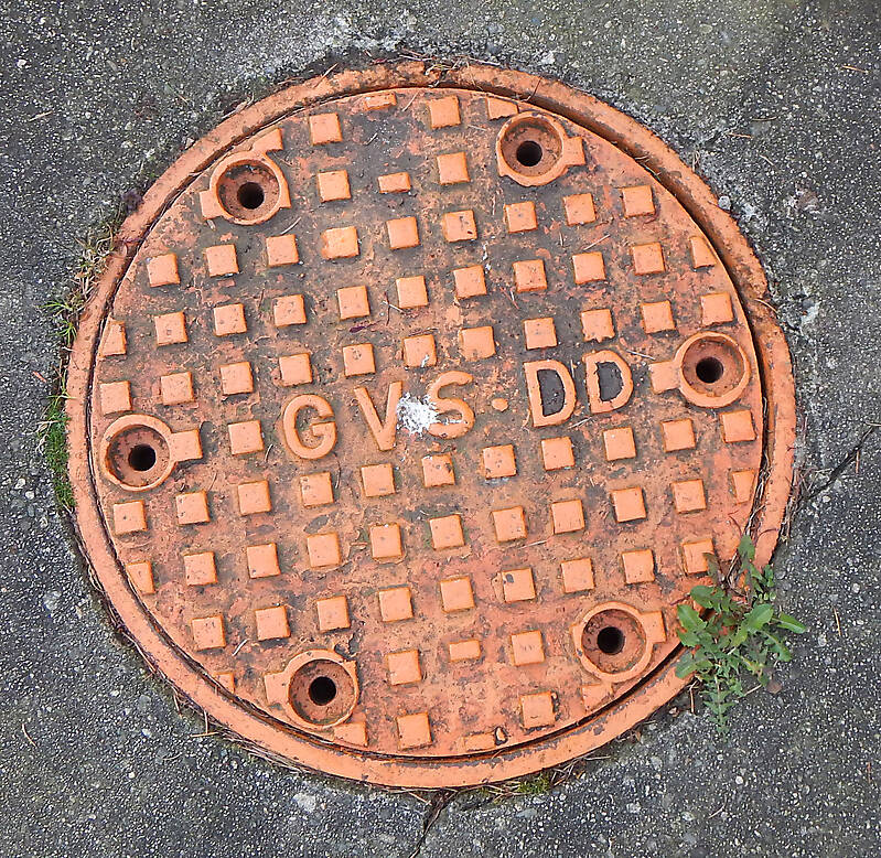 manhole cover orange big