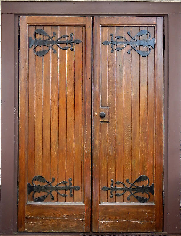 decorated wood double door