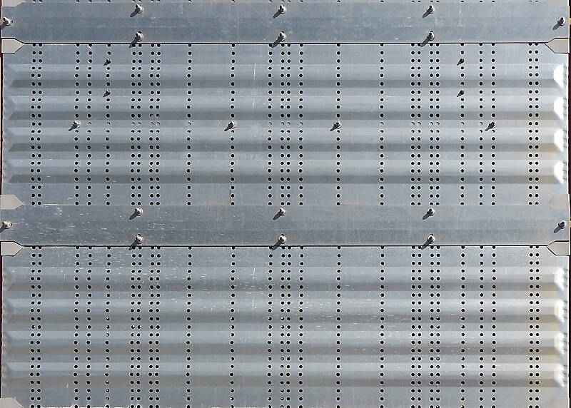 seamless metal panel with holes