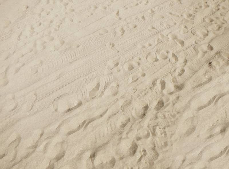 brown sand with footprints