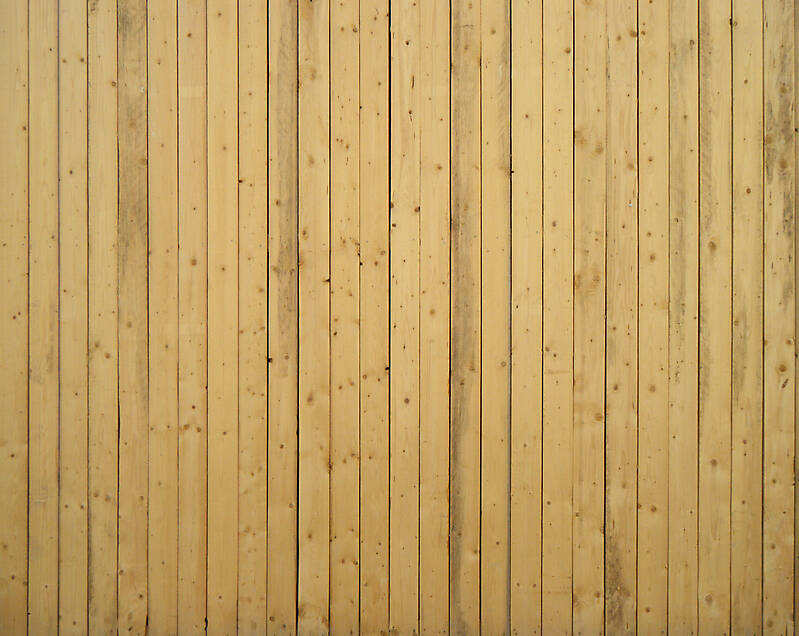 wood planks yellow fence