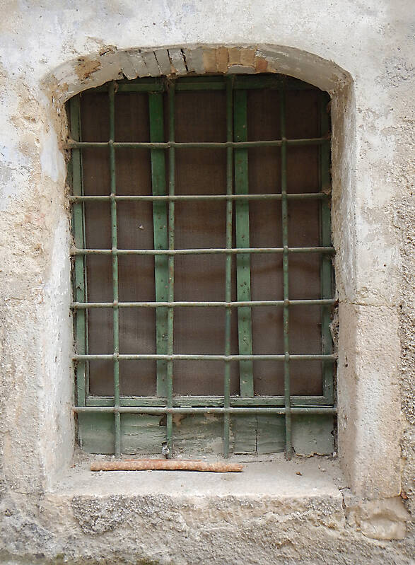 window medieval with rusty cage old paint
